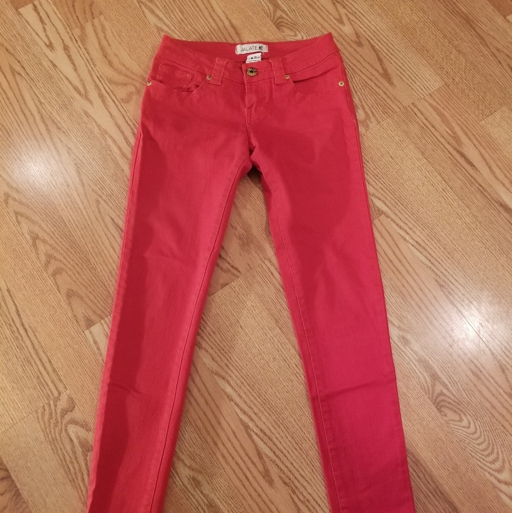 Red skinny low rise jeans